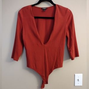 Express Deep brown orange (pumpkin) quar sleeved bodysuit with deep V neckline